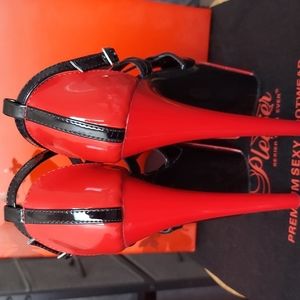 Pleaser strappy patent leather heels, size 8. 7-inch heels in red and black.